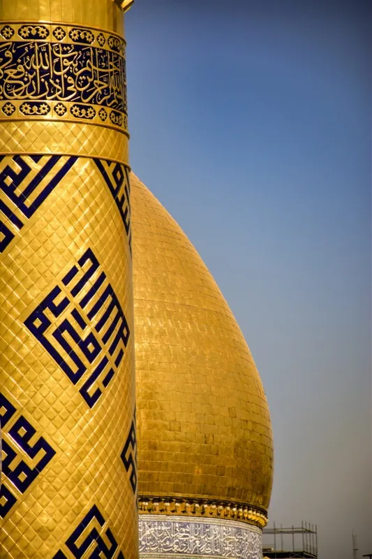 Golden dome and calligraphy of a Shia holy shrine
